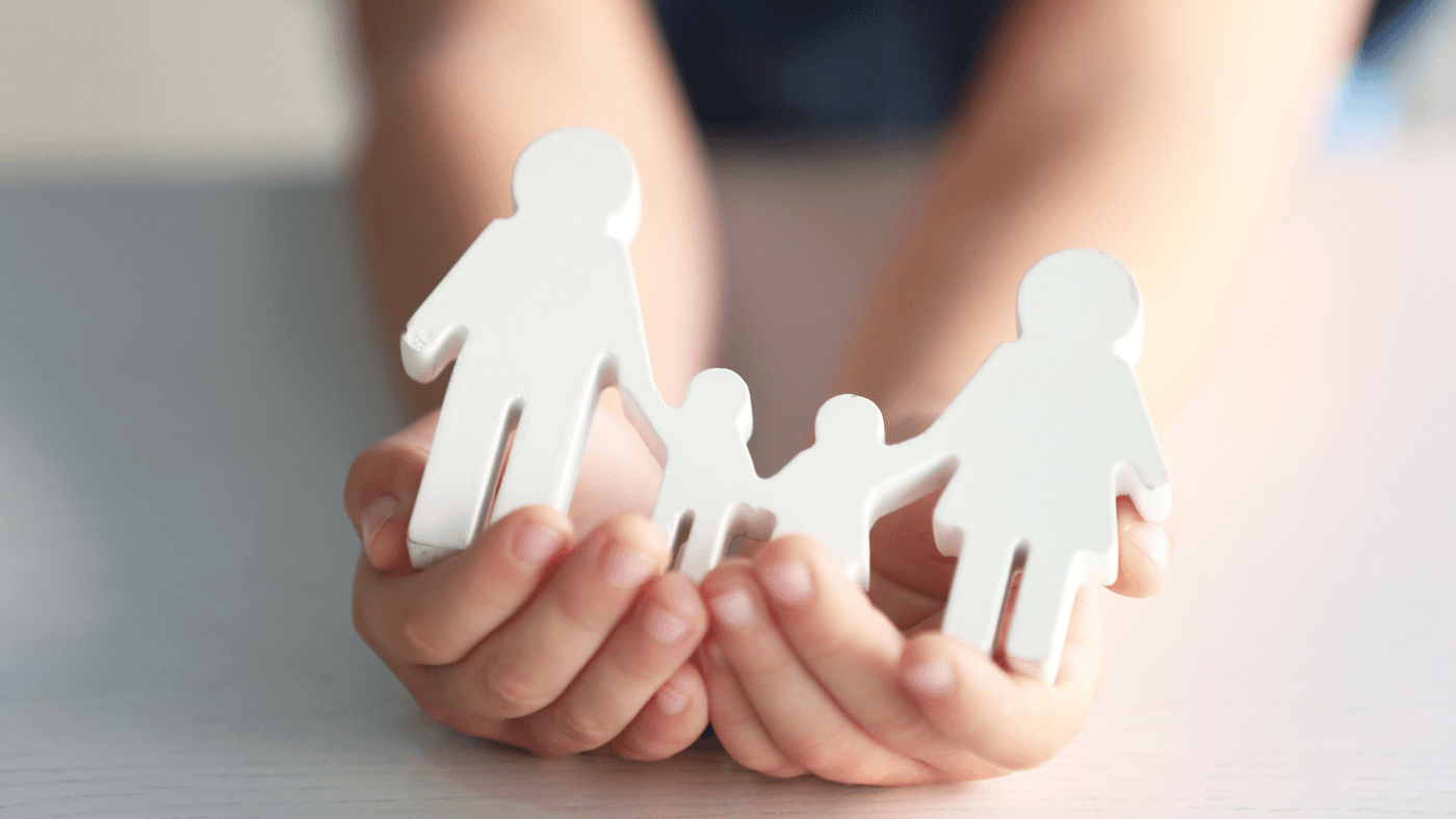 Hands holding white stick family